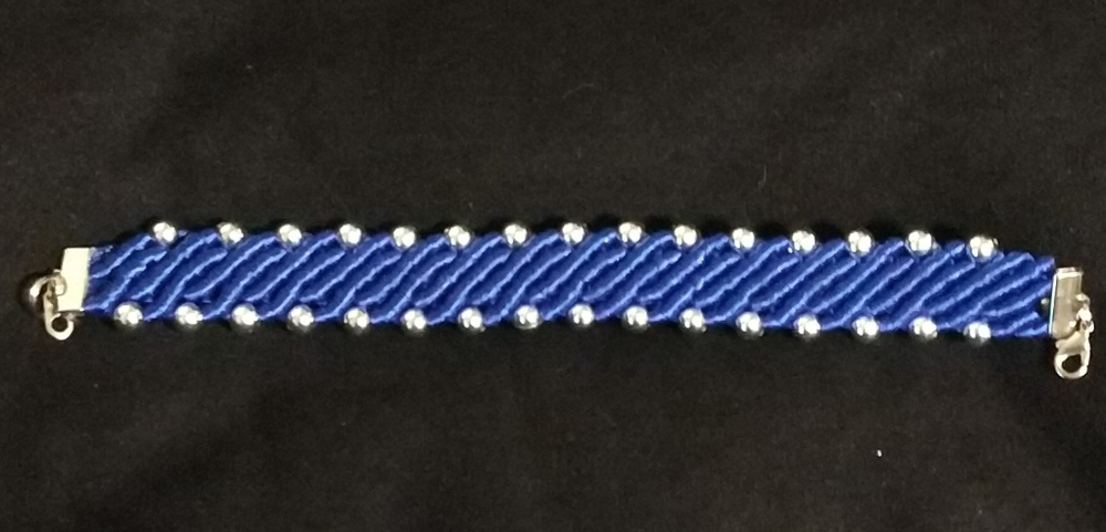 Silver and blue wrist band bracelet